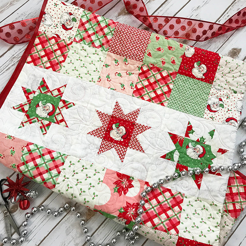 "Star Break” is a Free Christmas Quilt Pattern designed by Melanie Call from the Fort Worth Fabric Studio!